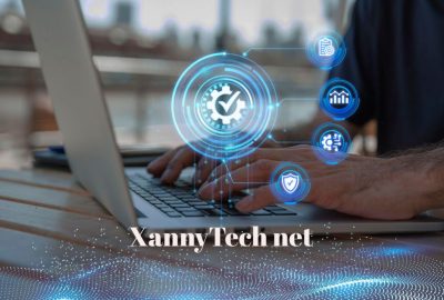 Person typing on a laptop with digital tech icons floating above, representing XannyTech net innovative platform